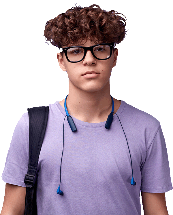 Teenager in a purple shirt with headphones around his neck with a serious look on his face